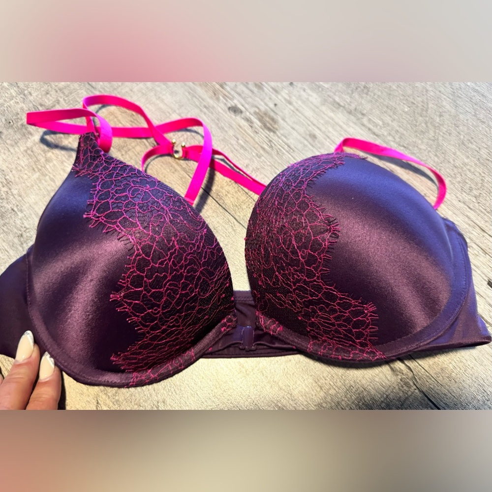 Victoria secret Bombshell plunge bra.  Adds 2 sizes up. Maroon and pink 36B